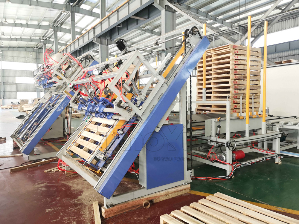 Automatic wood pallet nailing machine